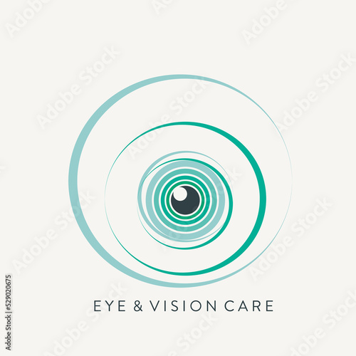 Eye logo, ophthalmology office.Medical icon for vision care.Green ring-shaped iris with pupil in center.Circular sign isolated on light background.Ocular, optic symbol.