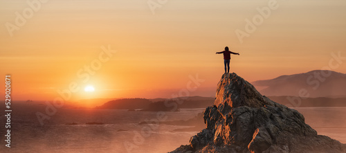 Adventurous Woman Hiking on the Rocky Coast with Mountains and Dramatic Sunset Sky. Adventure Composite. 3d Rendering Rocks. Background from West Coast of British Columbia, Canada.