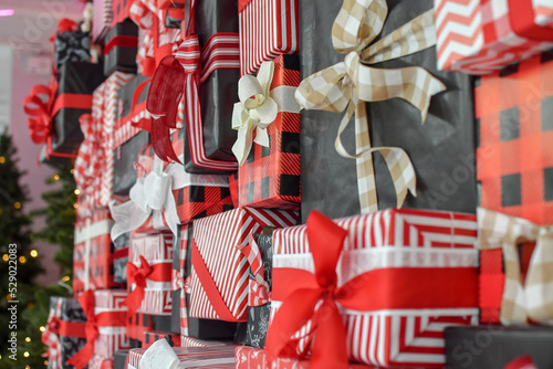 Wallpaper Mural Wall of many Christmas gift boxes for festive background. Selective focus.  Torontodigital.ca