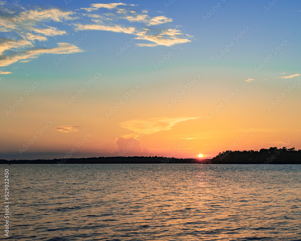 Horizontal sunset over southern lake
