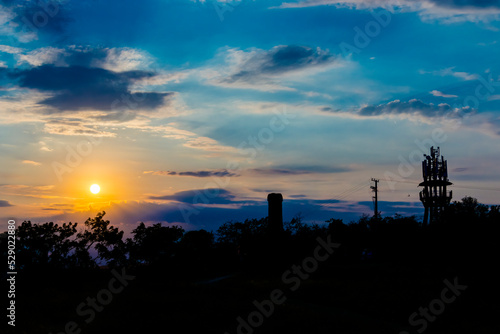 Sunset in Balatonkenese with a lookout transmission tower photo