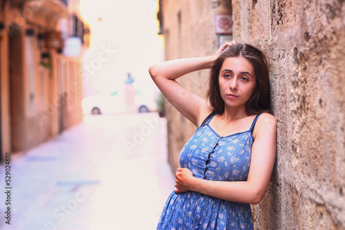 teenager girl close up street portrait in Spanish downtown line © ulianna19970