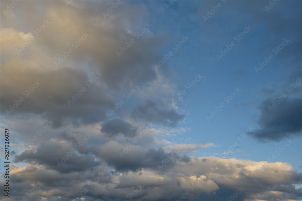 Russia. The South of Eastern Siberia. Gloomy sunset clouds in the evening summer sky over the mountain ranges of Eastern Sayan.