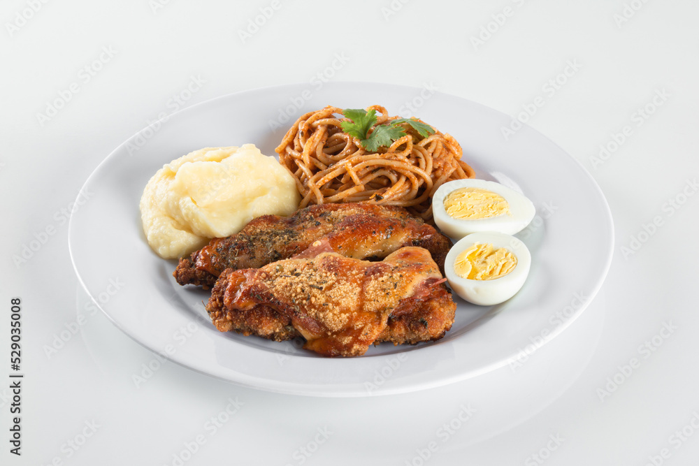 Lunch food plate. Pasta with roasted chicken, puree and eggs