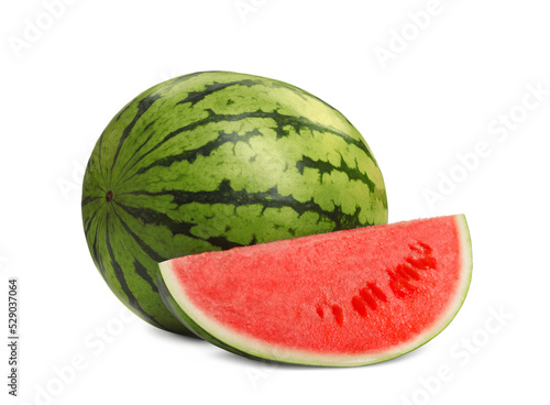 Ripe whole and cut watermelons isolated on white