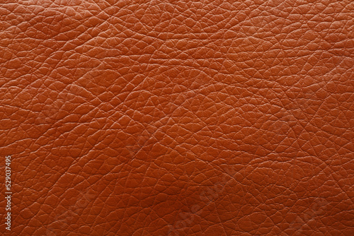 Texture of brown leather as background, closeup