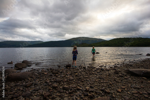 Children having fun playing on Loch Lomond Beech