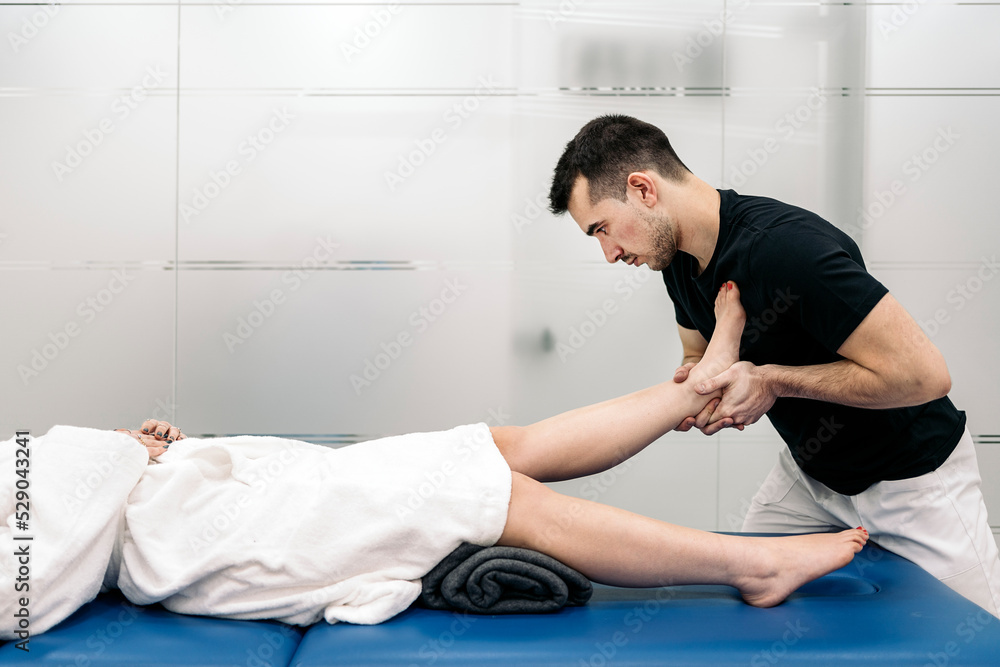 Man Working in Physiotherapy Clinic Man Working in Physiotherapy Clinic