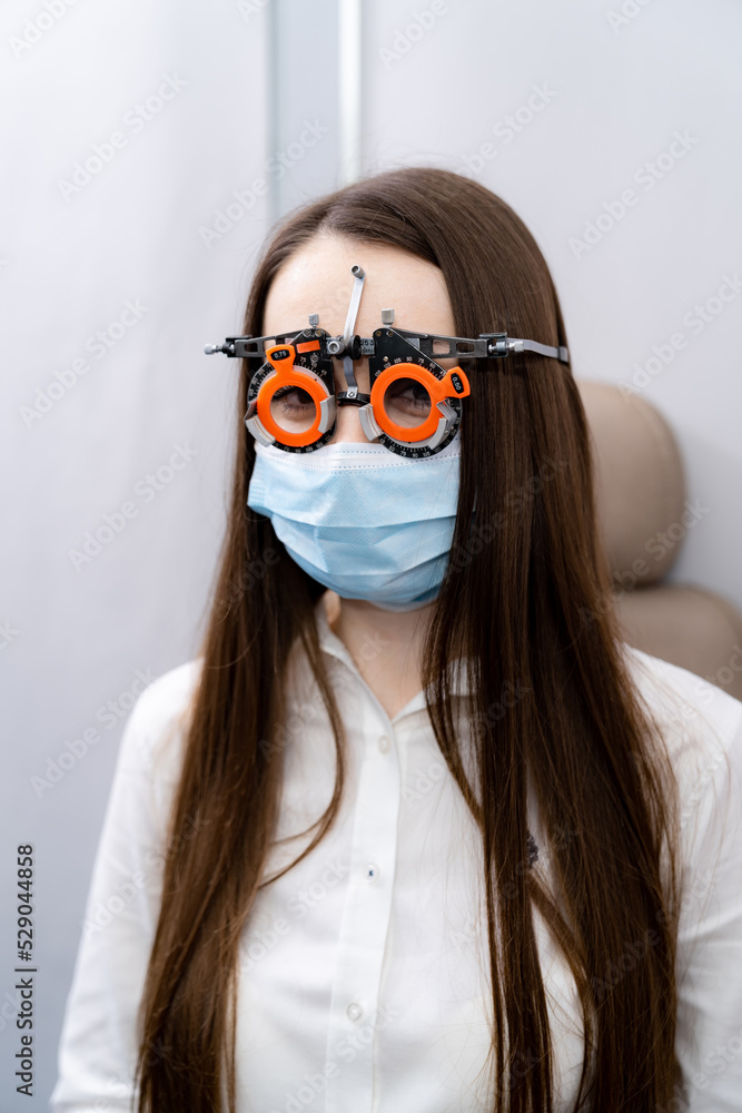 Eyesight corrective examination. Checking optometry vision at eye clinic. Eyesight corrective examination. Checking optometry vision at eye clinic.