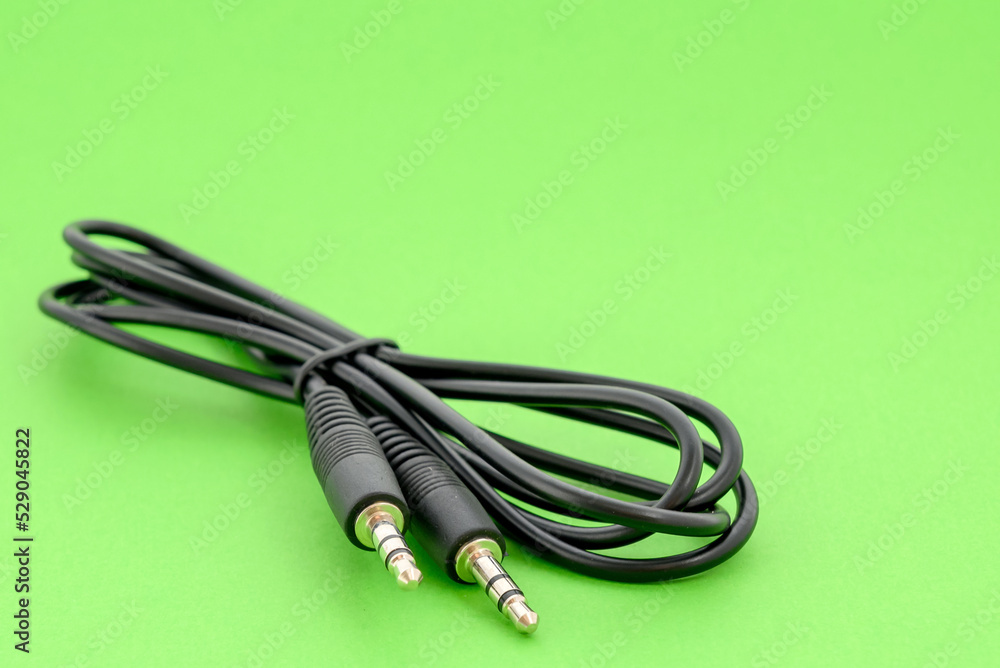 mini jack to mini jack connecting cable black close-up mini jack to mini jack connecting cable black close-up