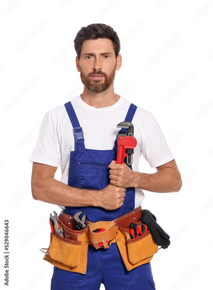 Professional plumber with pipe wrench and tool belt on white background Professional plumber with pipe wrench and tool belt on white background