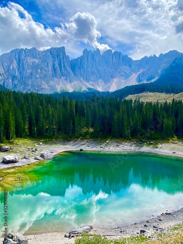Beautiful emerald Lago di Carezza lake in the Italian Alps  mountains