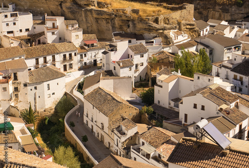 Beautiful panoramic view of Setenil de las Bodegas white houses on a sunny day. Andalusia, spain