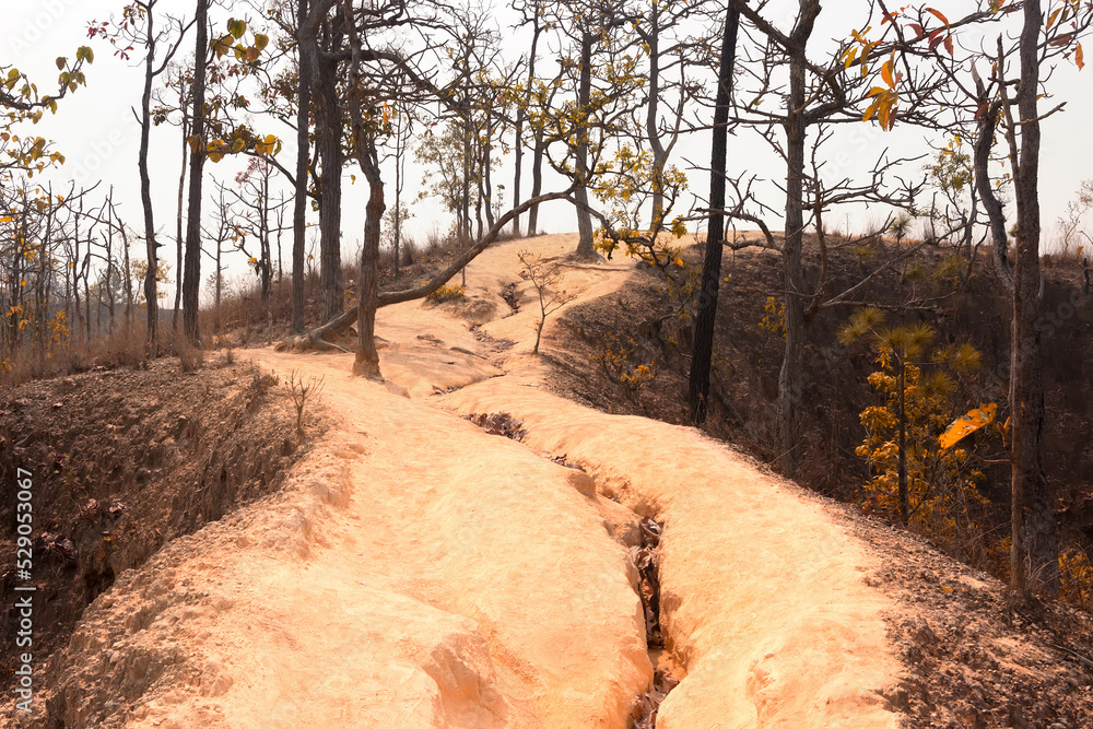 Not Steep Ridges Walker in mountain trail, go along the narrow ridge where the right and ...