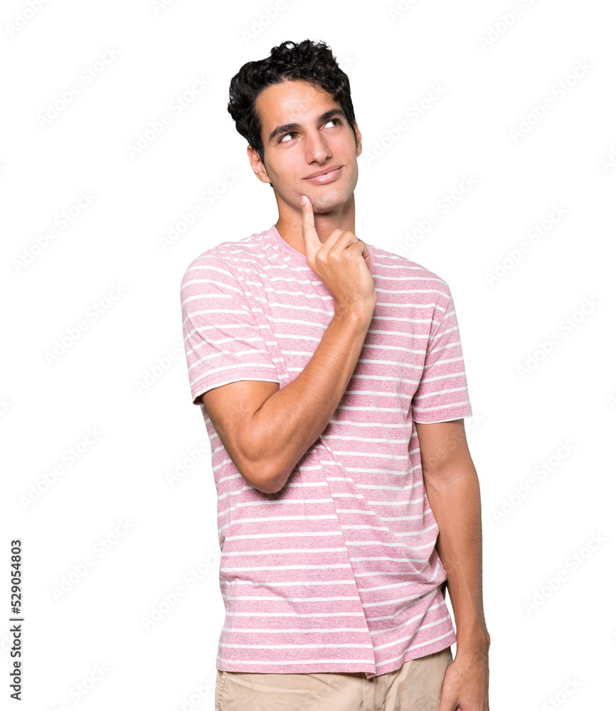 Happy young man making a gesture of doubt Happy young man making a gesture of doubt