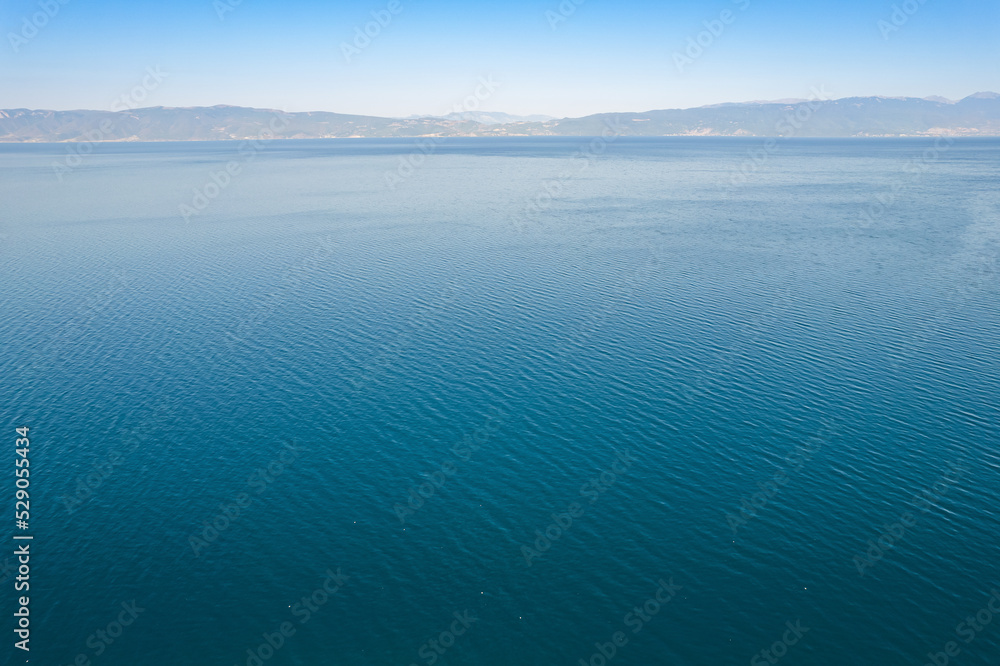 Aerial landscape view on Ohrid lake towards to Albania from North Macedonia Aerial landscape view on Ohrid lake towards to Albania from North Macedonia