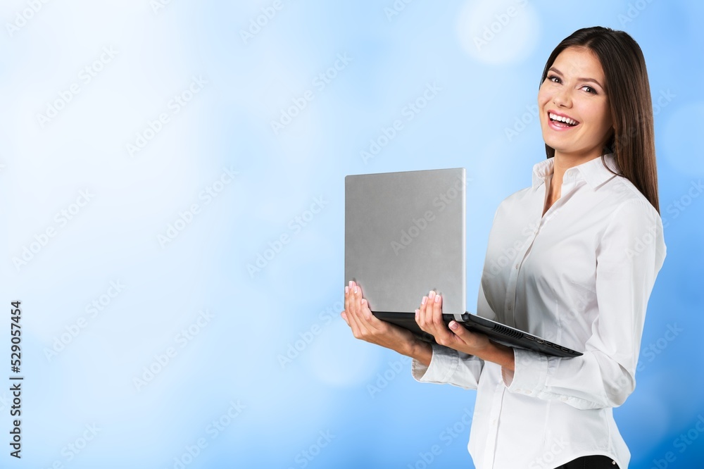 Portrait of attractive trendy cheerful skilled girl using laptop computer Portrait of attractive trendy cheerful skilled girl using laptop computer