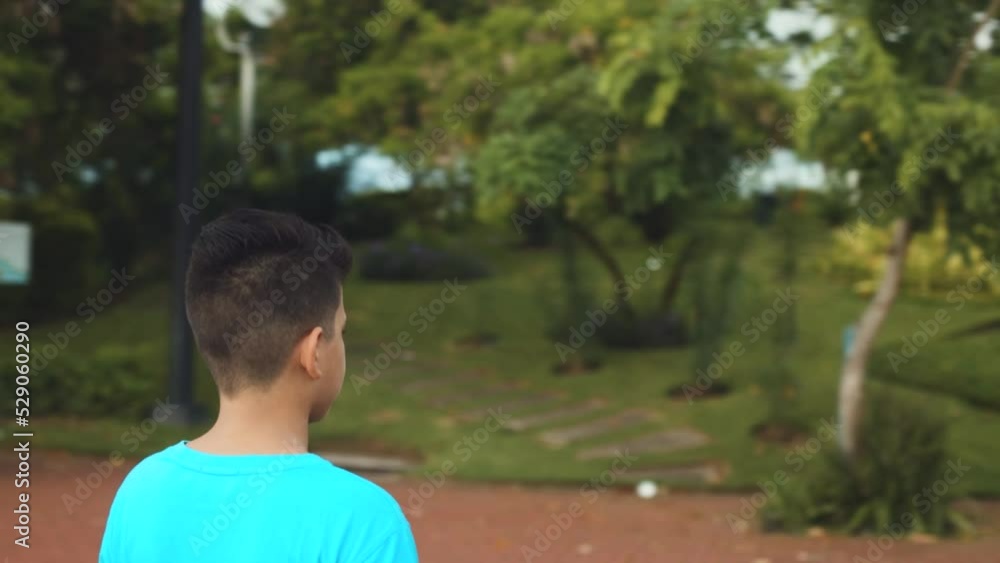 camera rotating around latin child, medium shot camera rotating around latin child, medium shot