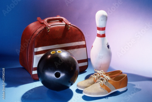 Bowling ball with a bowling pin and bowling shoes
