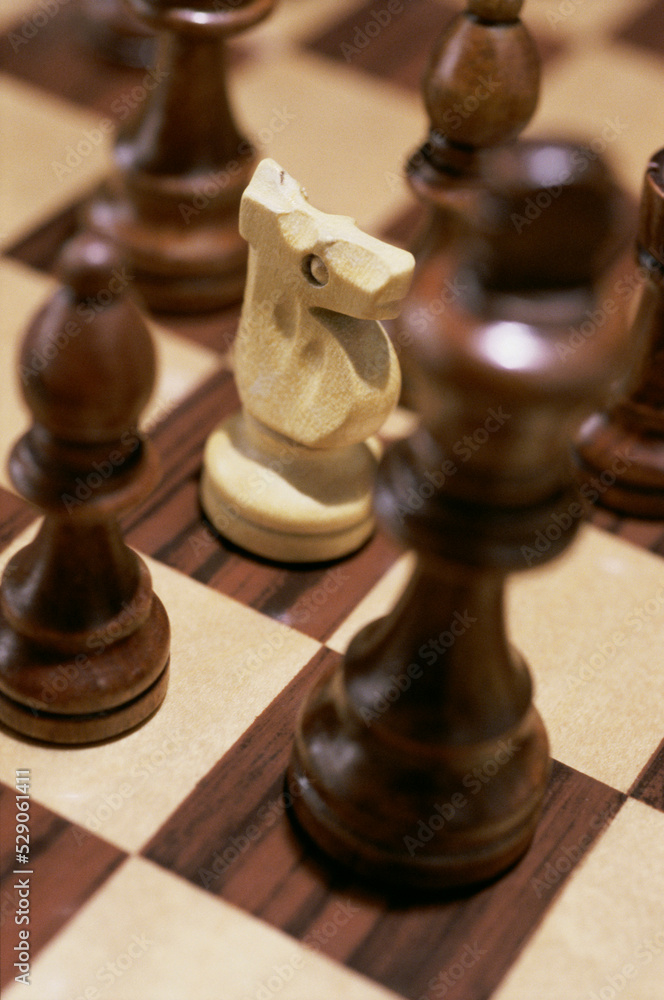 Close-up of chessmen on a chess board Close-up of chessmen on a chess board