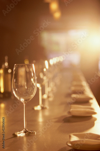 Glasses in a row on a bar