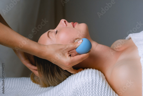 Vacuum cup spa procedure in the massage room for skin care and rejuvenation
