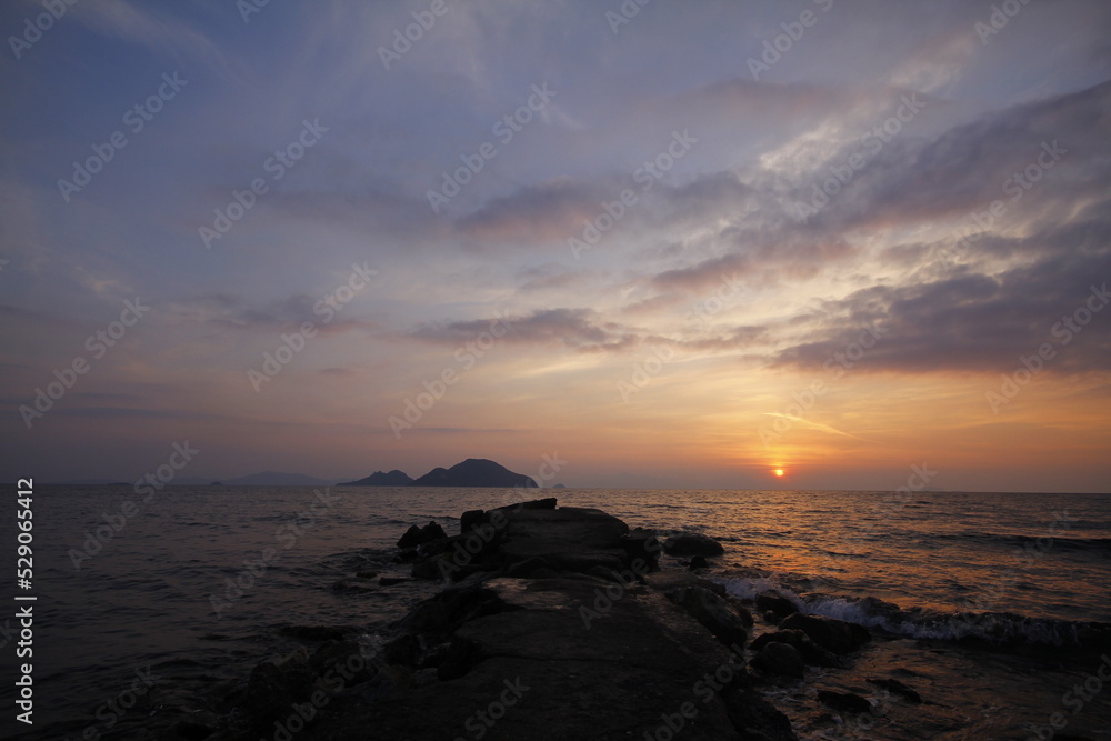 sunset on the beach. Seaside town of Turgutreis and spectacular sunsets. Selective Focus.	