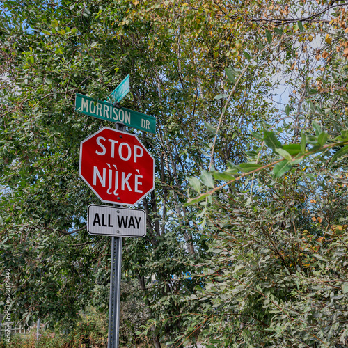 Stop sign in Yellowknife with English and Wiliideh, the dialect spoken by the Dene in the area