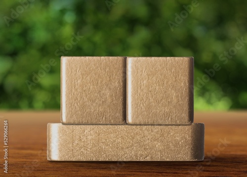 Cubes for calendar date text on wooden blocks with blurred background park. Calendar concept