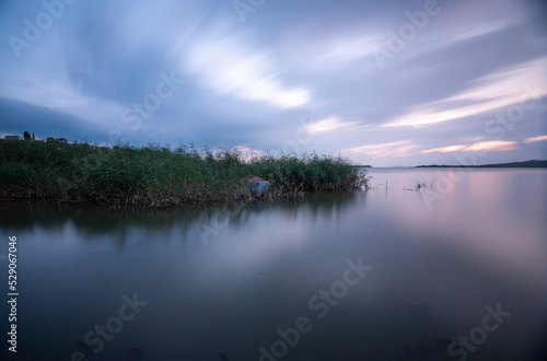 Long Exposure, Uluabat lake at sunset colors and clouds with a long exposure shot