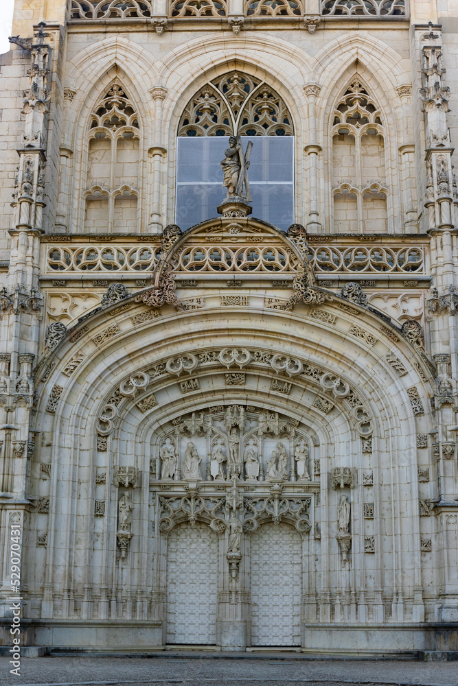 Gothic style details of facade of Royal Monastery of Brou at French town of Bourg-en-Bresse, department of Ain, Auvergne-Rhone-Alpes region