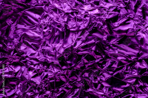 metallic purple colored texture background abstract. Aluminium crumpled.  © Mineral Vision