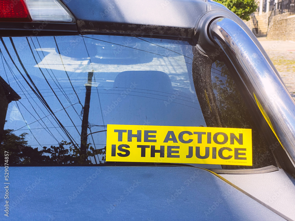 Encouraging bumper sticker message on a car window that says "The
