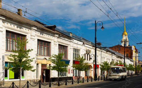 Krestovaya street in Rybinsk with view of shops and residential buildings. photo