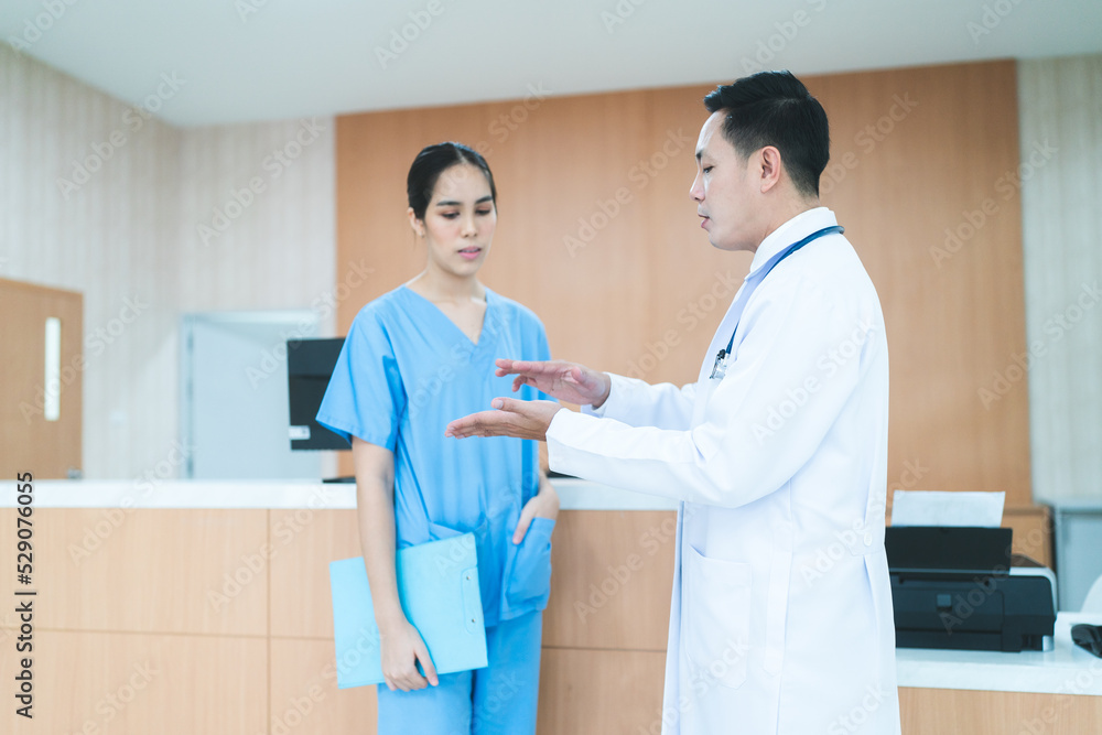 professional specialist doctor talking with medicine staff at hospital, man and woman medical person discussion about clinic healthcare for service professional specialist doctor talking with medicine staff at hospital, man and woman medical person discussion about clinic healthcare for service