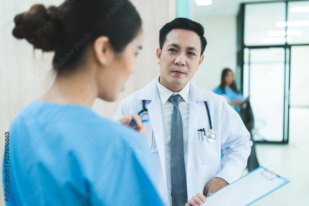professional specialist doctor talking with medicine staff at hospital, man and woman medical person discussion about clinic healthcare for service professional specialist doctor talking with medicine staff at hospital, man and woman medical person discussion about clinic healthcare for service