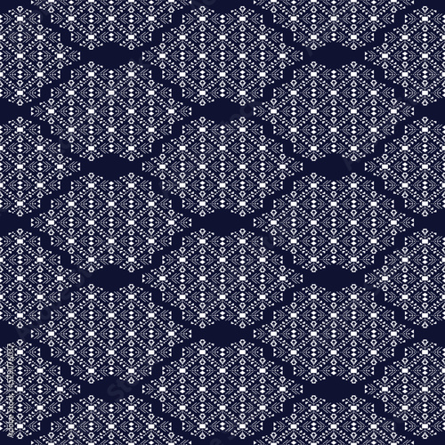 Ethnic abstract ikat art. Seamless pattern in tribal, folk embroidery, and Mexican style. Aztec geometric art ornament print.Design for carpet, textile, cover, wallpaper, fabric, wrapping, clothing,