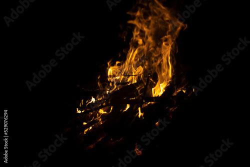 Bonfire in dark. Fire on black background. Details of flame. © Олег Копьёв