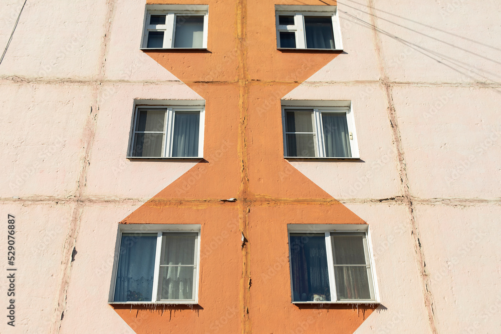 Window to building. Ordinary house in detail. Residential building in city.