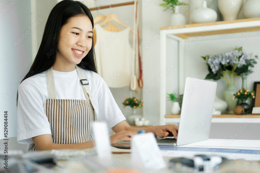 Young businessowner excited feel ecstatic reading great online news on laptop. Young businessowner excited feel ecstatic reading great online news on laptop.