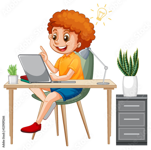 A boy browsing internet on laptop