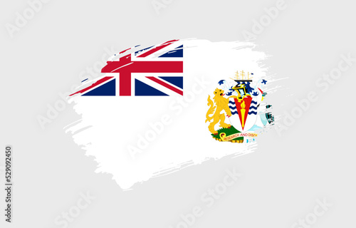 Creative hand drawn grunge brushed flag of British Antarctic Territory with solid background