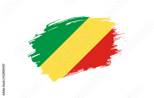 Creative hand drawn grunge brushed flag of Republic of the Congo with solid background