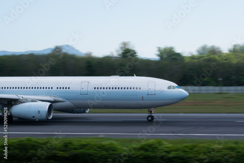 Passenger plane, run on the runway. Air travel on vacation