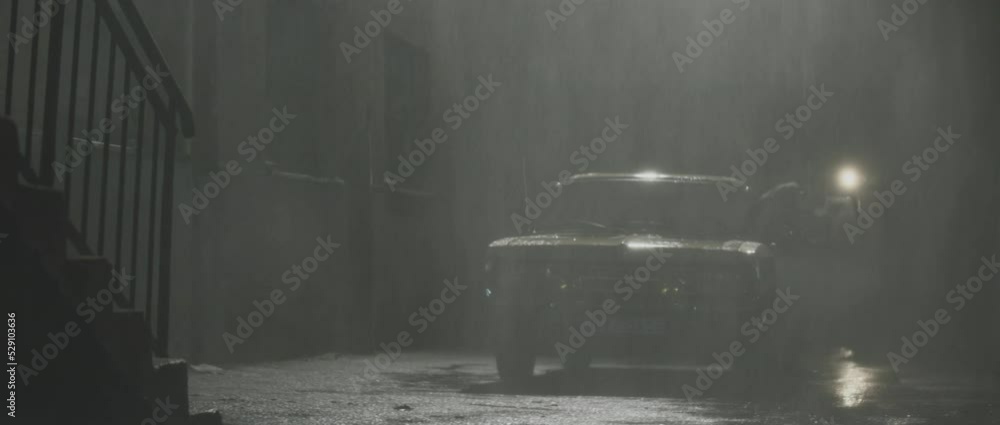 Investigator getting out of car and walking on crime scene, night rainy street. Retro style detective using deduction for solving challenging cases.