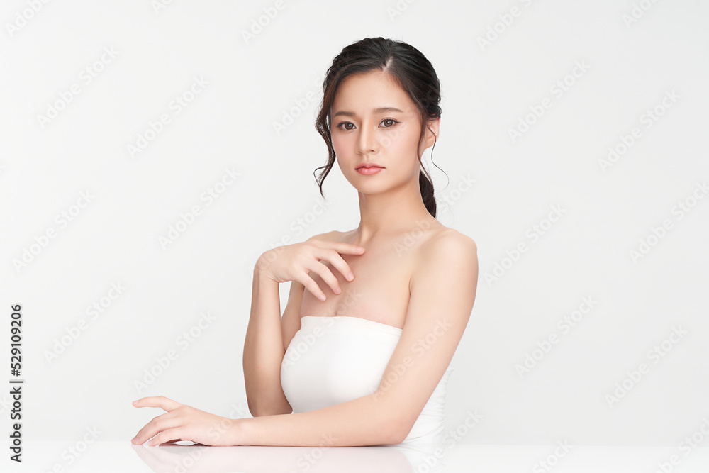 Beautiful young asian woman with clean fresh skin on white background, Face care, Facial treatment, Cosmetology, beauty and spa, Asian women portrait. Beautiful young asian woman with clean fresh skin on white background, Face care, Facial treatment, Cosmetology, beauty and spa, Asian women portrait.