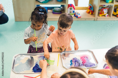 Fotografia Sensory play at multi-cultural nursery school