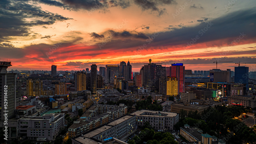 Obraz premium Cityscape of Changchun, China under the setting sun