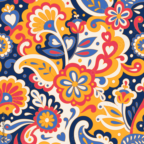 Colorful folk psychedelic seamless pattern. Retro ethnic ornament. Vintage vector background. Hippie 70s styled groovy textile print. Floral motifs