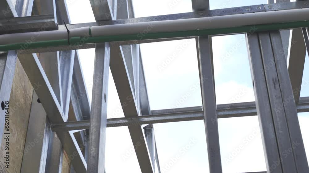 Close up of steel framing at house construction site, up shot Close up of steel framing at house construction site, up shot